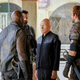 Picard, surrounded by an unamused assortment of Romulans.